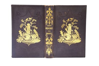 un livre noir aux bords dorés, orné d'une illustration représentant un homme et une femme
