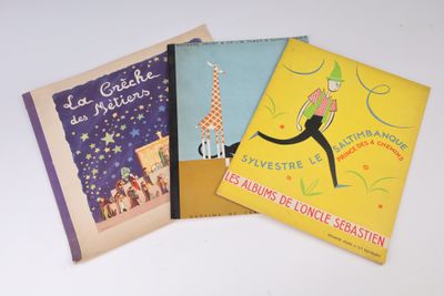 trois livres pour enfants sont alignés sur une surface blanche