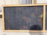 a picture of a picture of a blackboard with rust on it