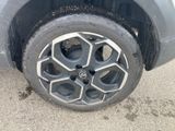 a tire that has been scratched off of the car