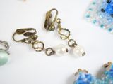 a close up of some jewelry on a table