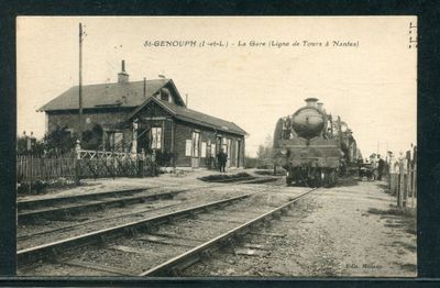 une vieille photo d'un train qui arrive sur les rails