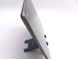a close up of a cell phone on a stand