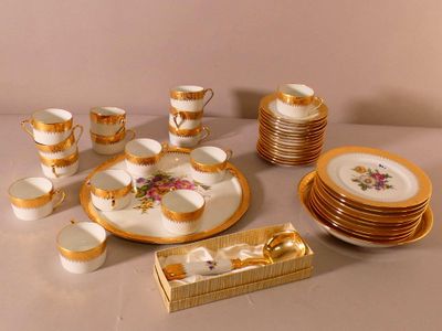 a lot of plates and cups on the table