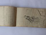 an open book with a drawing of a hand holding a knife