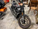 a motorcycle that is parked in a garage