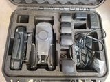 a case that has a remote control and other items in it