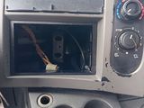 a picture of a car dashboard with a broken radio