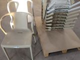 a stack of chairs and a chair on a pallet