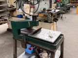 a machine that is sitting on a table in a factory