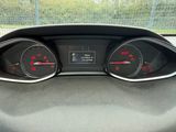 the dashboard of a car with three gauges and a clock on it