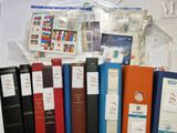 a lot of books that are sitting on a table