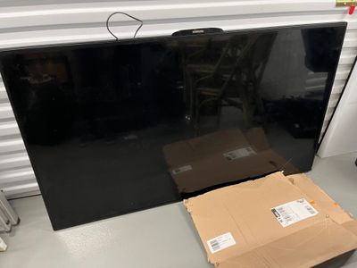 an image of a flat screen tv sitting on top of a table