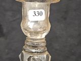 a glass vase that has a number on it