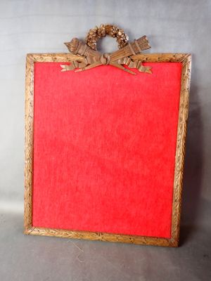 an image of a red picture frame with a bow on it