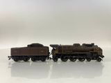 a toy train that is sitting on a white surface