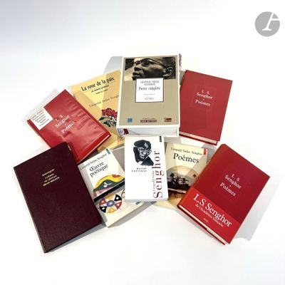 a lot of books that are sitting on a table