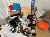 a table with a lot of office supplies on it