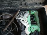 a tool in a box that is sitting on the floor