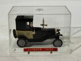 a small model of a car in a clear box