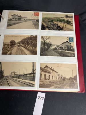 a book with pictures of trains on it on a table