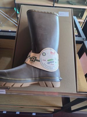 a box with a pair of boots on top of it