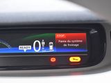 a digital display on the dashboard of a car