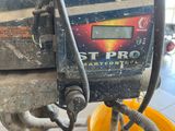a close up of a machine that is on the ground