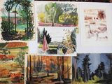 many different pictures of a painting on a table