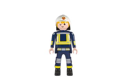 Figurine de pompier Legoland avec casque, sur fond blanc