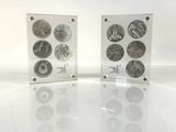 two clear acrylic boxes with different types of coins on them