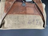 a brown bag with writing on it sitting on a table