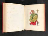 an open book with a drawing of a man holding a cross