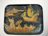 a tray with a painting of a boat and people on it
