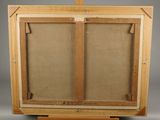 a wooden easel with a painting on top of it