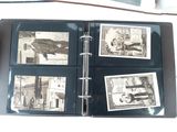 a black binder with pictures of people and cars on it
