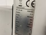 a close up of a machine with a sign on it