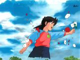 an image of a girl in a red shirt and blue skirt holding a red apple