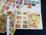 many different types of stamps on a table