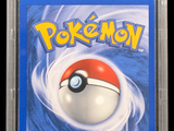 the card is in a plastic case with a pokemon logo on it