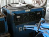 a machine that is sitting next to a blue machine