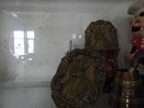 a glass display case with a couple of figurines on it
