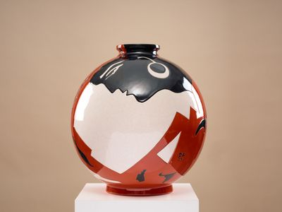 LONGWY "Visage Noir" Vase boule coloniale en faïence émaillé…