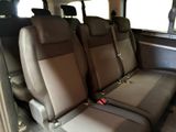 two seats in the back of a van that are empty