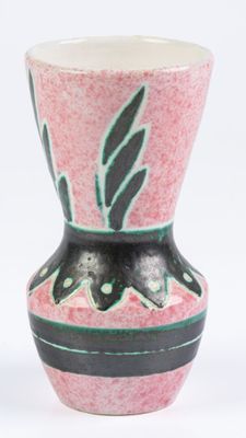 a pink vase with a black and green design on it
