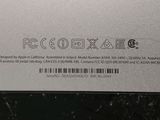 the back of a white box with a sticker on it