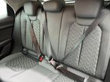 a seat belt that is attached to the back of a car