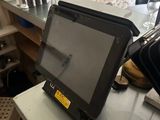 a tablet computer sitting on top of a counter