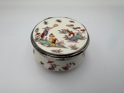 an image of a small white box with a bird design on it