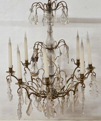 an image of a chandelier made of glass and metal